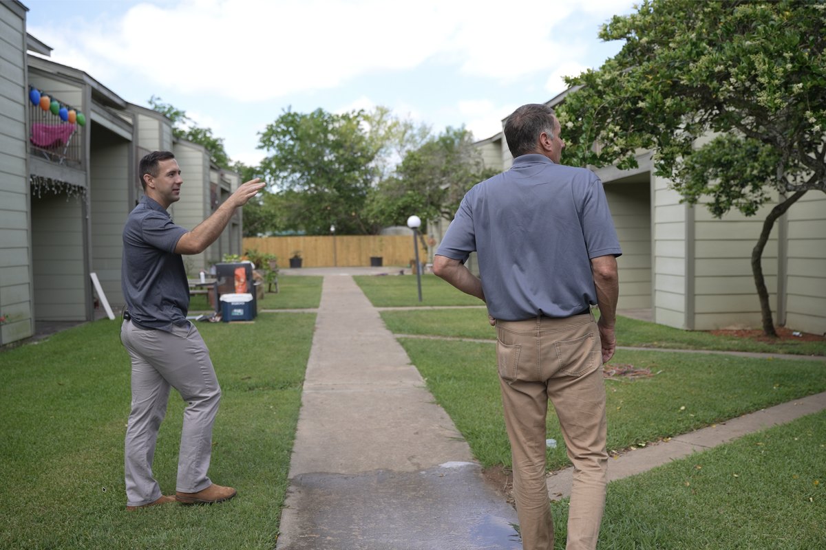 Ryan walking a property and pointing out details